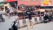 Hapur Youth Walks on Busy Road with Bike on Shoulder for Instagram Reel, Police Search On