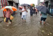 Mumbai receives 100 mm rain in 24 hours; local trains delayed
